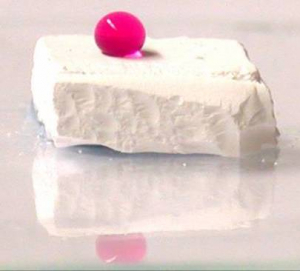 A droplet on top of a foam block