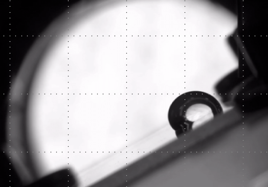 A droplet sliding on a sloping surface